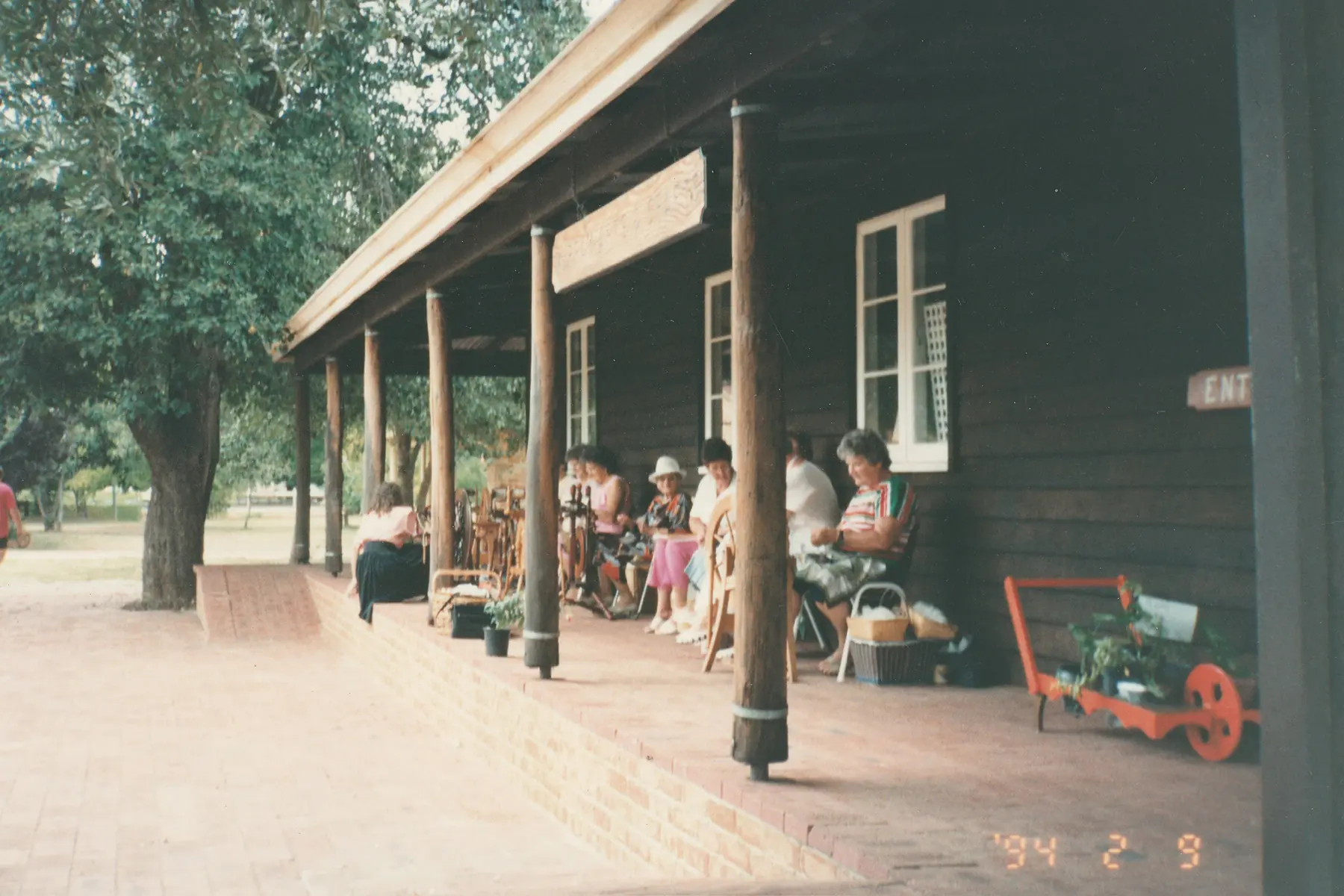 Murray Arts and Crafts members crafting outdoors together.